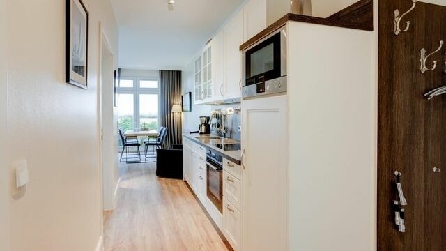 Ferienwohnung in Fehmarn OT Fehmarnsund - Strandresidenz Vogelflug Meerblick Porschen - Bild 8