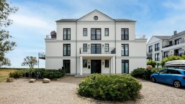 Ferienwohnung in Fehmarn OT Fehmarnsund - Strandresidenz Vogelflug Meerblick Porschen - Bild 17